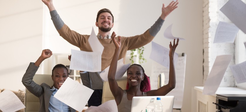 IRS forms for affordable care act ACA being thrown in the air in celebration
